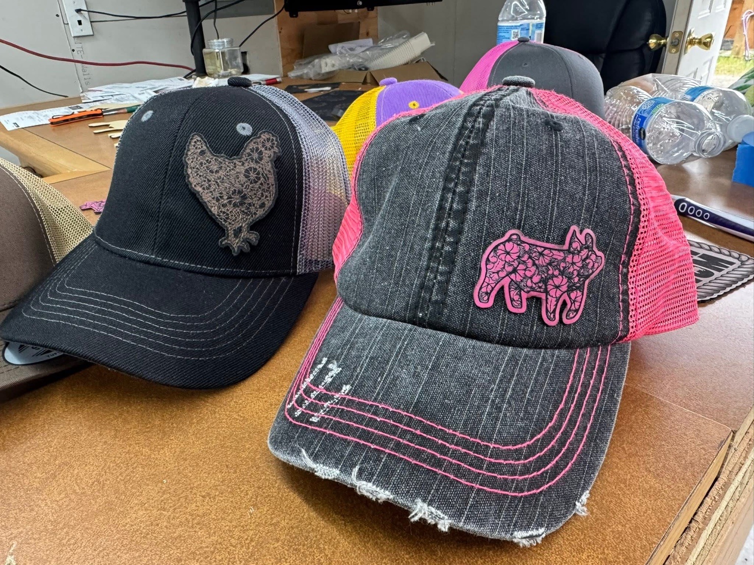 Personalized hats with decorative animal patches