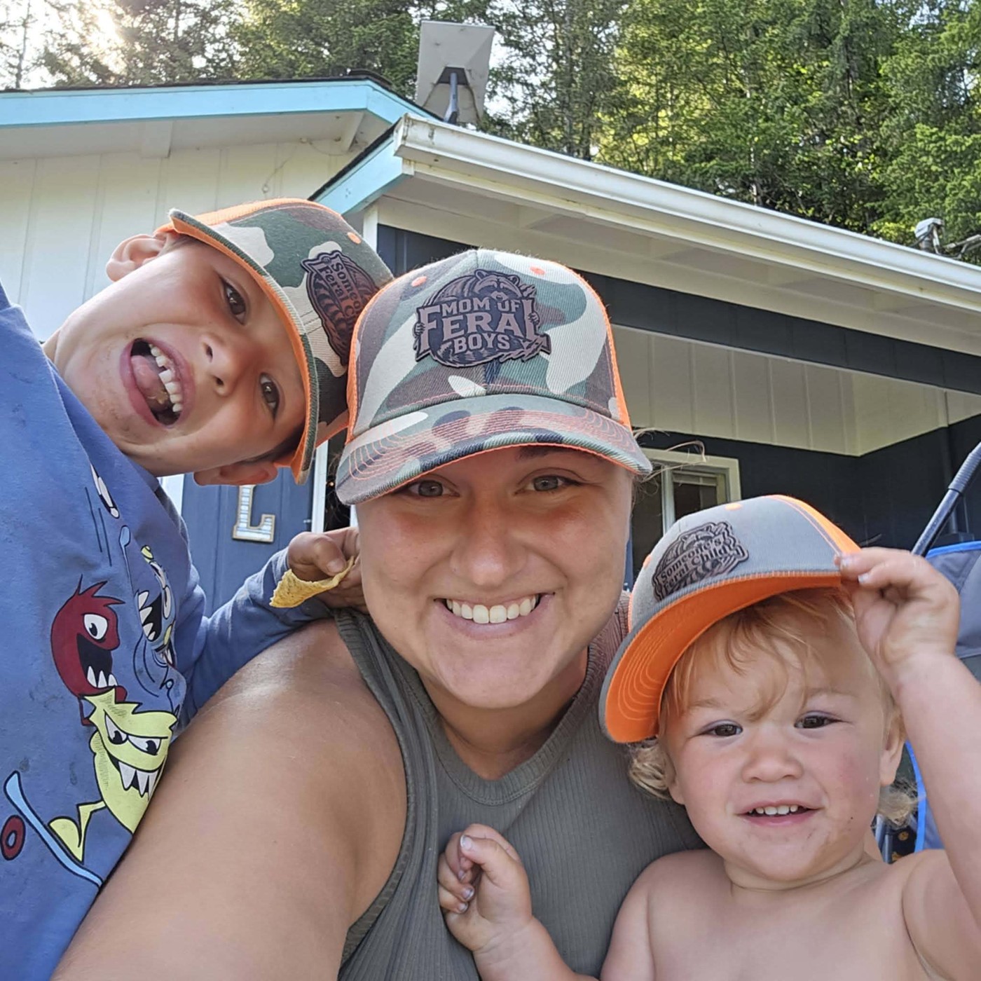 Family wearing personalized camouflage hats with custom patches
