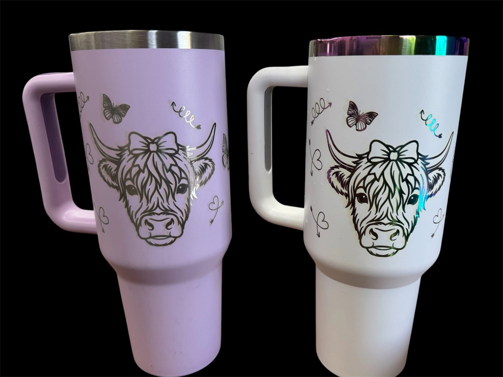 Lavender and white personalized tumblers engraved with highland cow designs